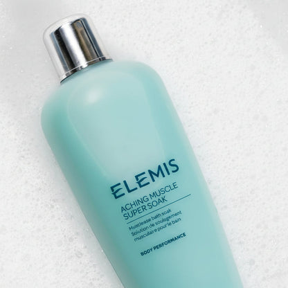 Elemis Aching Muscle Super Soak bottle on a textured white background