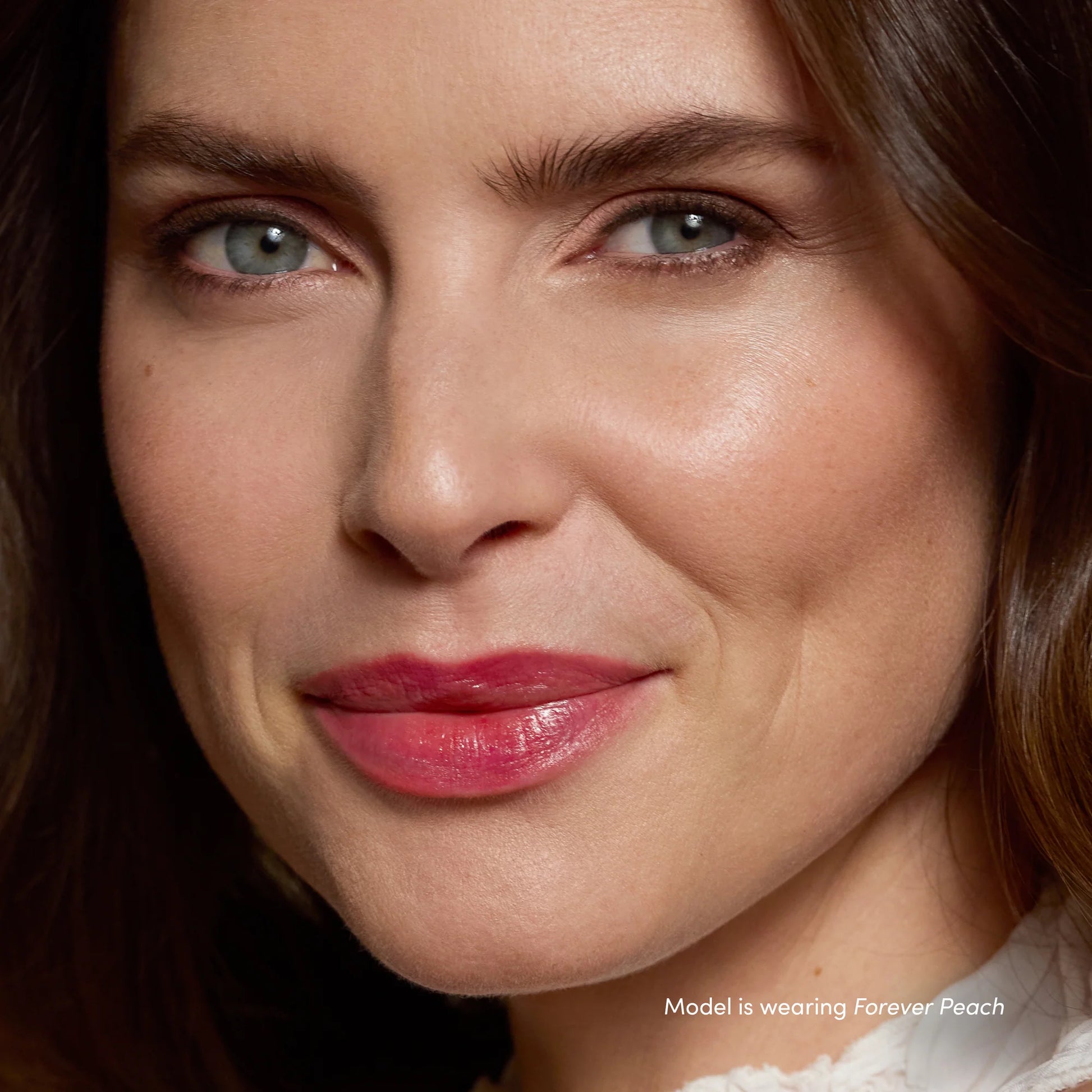 Forever Peach - Model wearing lip stain shade Forever Peach